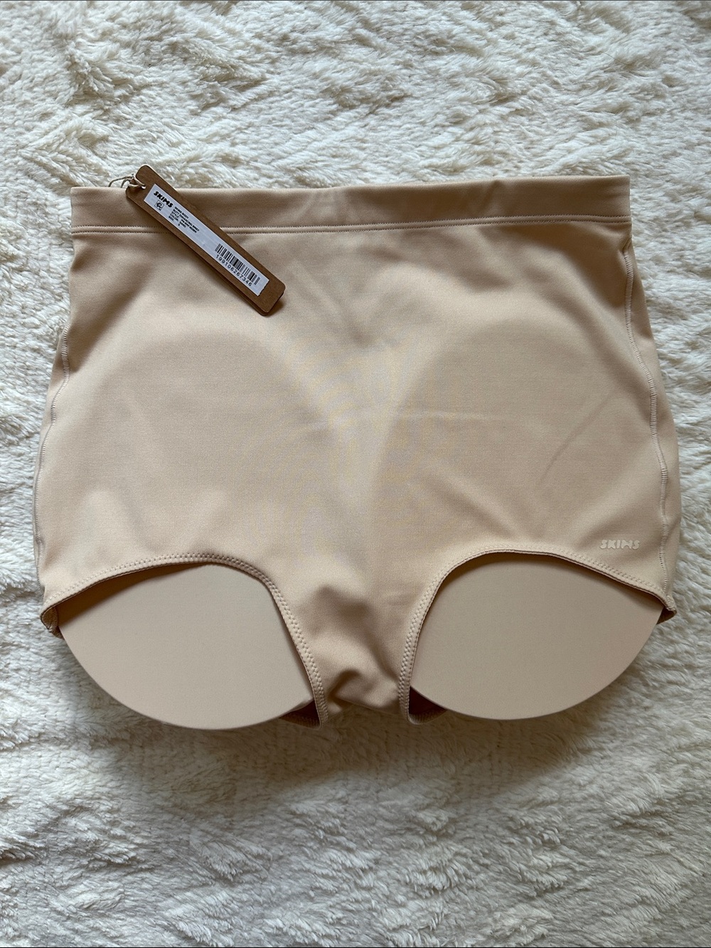 SKIMS BODY butt enhancing briefs in Sand